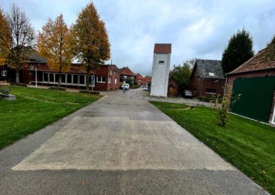 Lisa Maria Baier — Let's talk on the street — Intervention with high-pressure cleaners in the public space of the artists' village of Schöppingen – a series of reactions — 2025