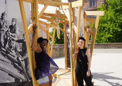 Lisa Maria Baier — Marta —Installation in public space with images from a specially trained AI to fill gaps in the city archive Aschaffenburg —2025